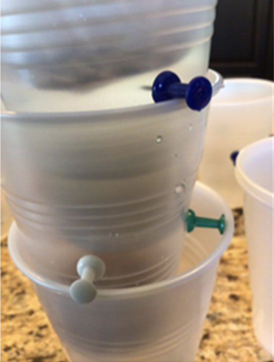 Filter kit materials laid out for students to build a water filter